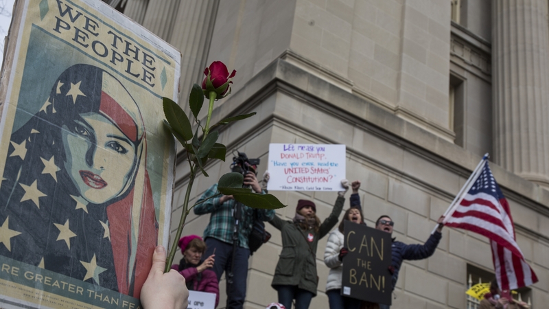 Demonstrators protest in Washington against the travel ban
