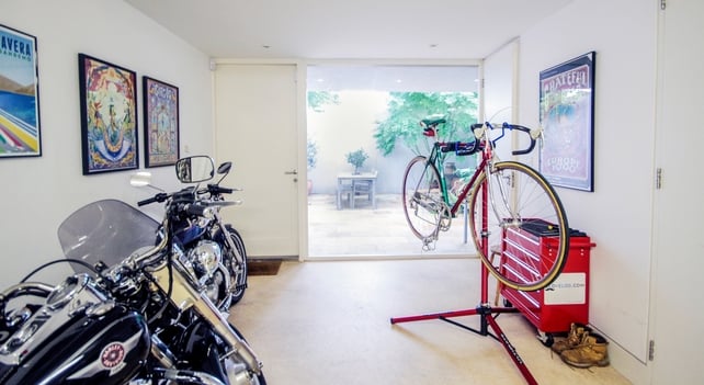 Alec's dream workshop where he restores racing bikes