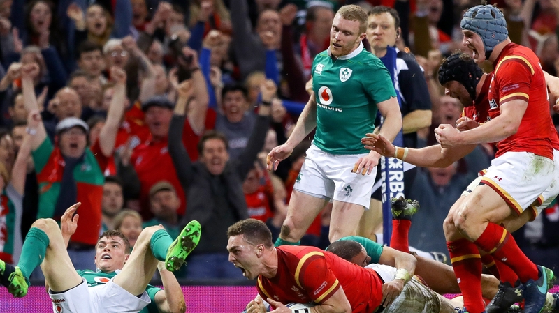 Wales' George North celebrates scoring their first try