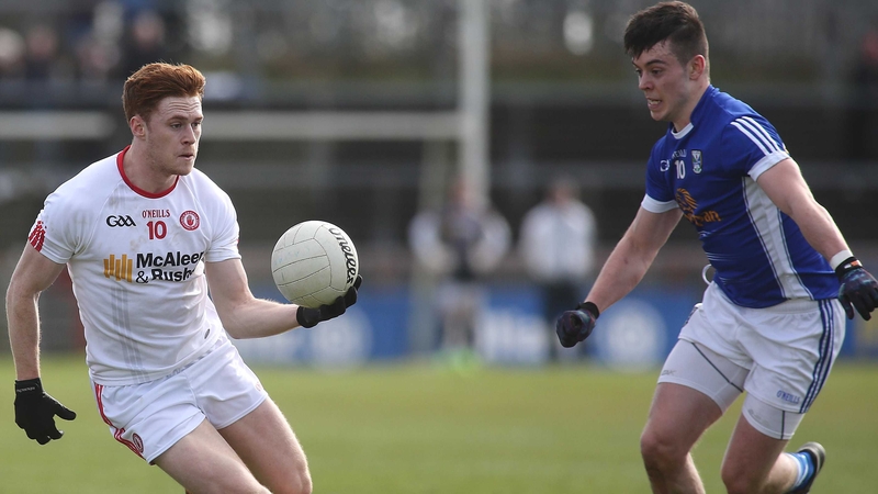 Gerard Smith of Cavan closes down Tyrone's Peter Harte