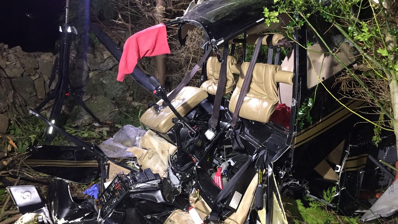 The fire brigade had to use cutting equipment to release the men from the helicopter