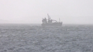 One crew member was recovered from the water in a critical condition at around 7am