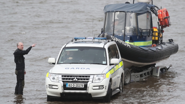 Members of the garda water unit prepare to join the search for the helicopter