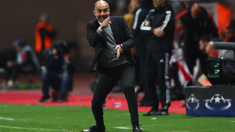 Pep Guardiola barks instructions at his Manchester City players from the sideline