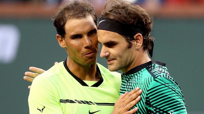 Rafa Nadal (L) and Roger Federer clash in the French Open semi-final on Friday