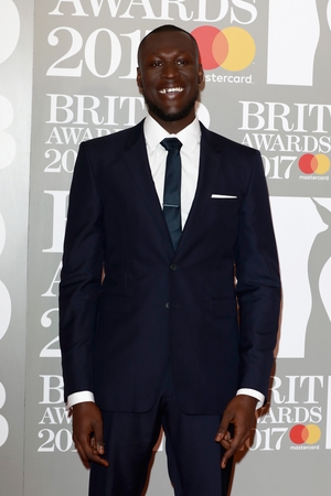 The one and only Stormzy before killing it at the Brits this year. He looks so classy in this Burberry suit.