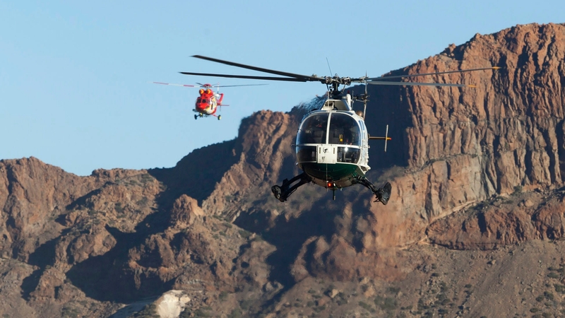 Four helicopters evacuated the tourists, many wearing shorts and sandals, from shelters near the summit of the volcano