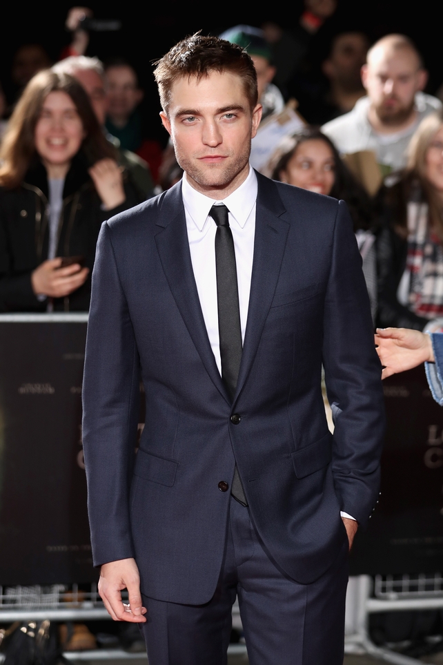 A mysterious look and an elegant tuxedo. Robert Pattinson hits the red carpet at the 'Lost City of Z' UK Premiere this year.