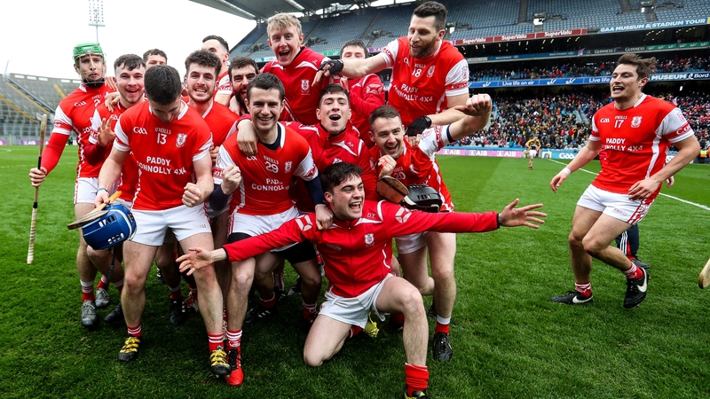 Cuala players celebrate at the final whistle