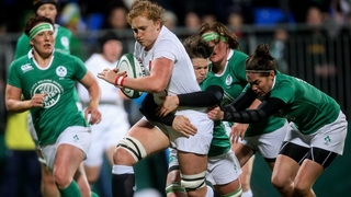England's Harriet Millar-Mills is tackled by Nora Stapleton and Ciara Griffin