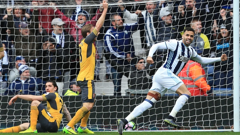 Hal Robson-Kanu (R) wheels away in celebration