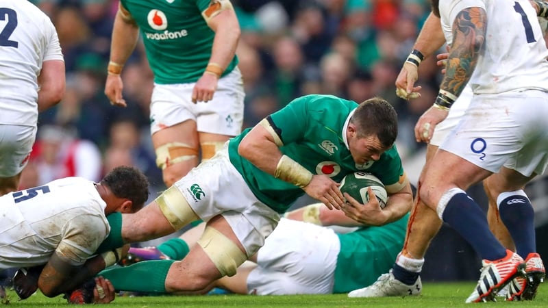 Peter O'Mahony is tackled by Courtney Lawes