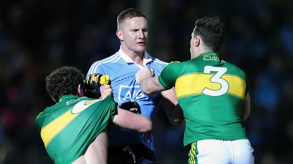 Kerry's Tadhg Morley and Mark Griffin tangle with Ciaran Kilkenny of Dublin in Tralee