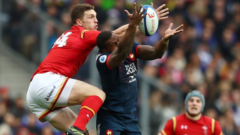 North competes for a high ball against the French