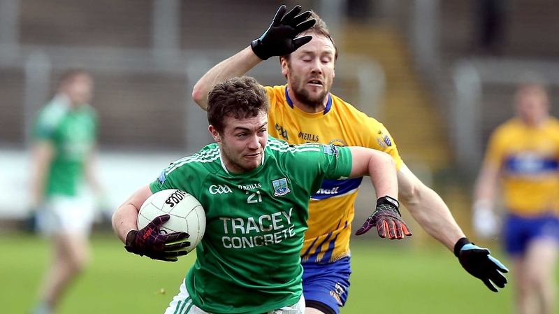 Fermanagh's Eoin McManus holds off Clare's John Hayes