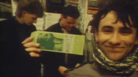 U2 fan with ticket at HMV on Henry Street, Dublin