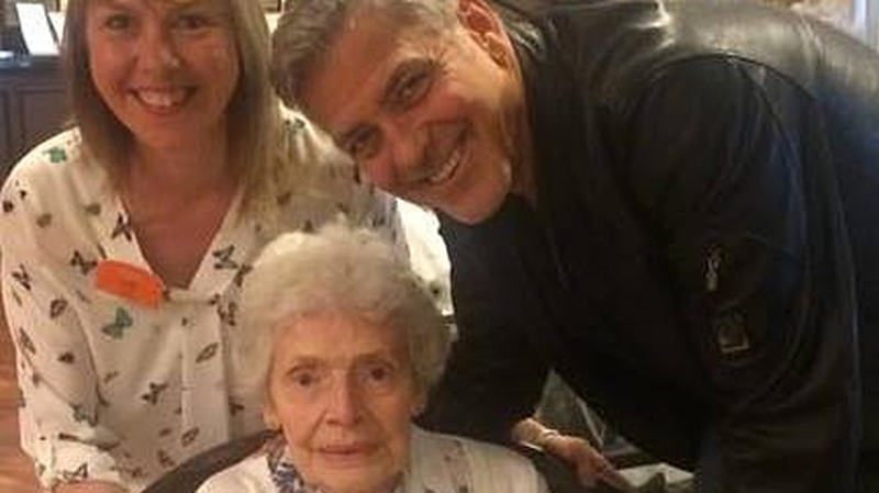 Linda Jones with birthday lady Pat Adams and surprise guest George Clooney Photo: Linda Jones