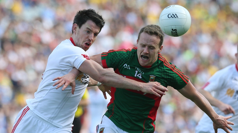 Tyrone's Mattie Donnelly and Andy Moran of Mayo in the 2016 All-Ireland quarter-final