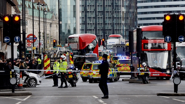 A policeman was fatally stabbed and his apparent attacker was shot by officers and later died