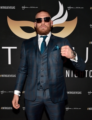 UFC Champion Conor McGregor arrives at the official after-fight party at the Wynn in 2016. The man loves a good three piece suit.