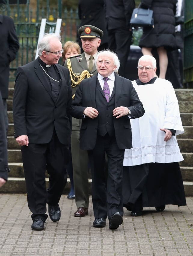 President Michael D Higgins arrives at St Columba's Church in Derry city