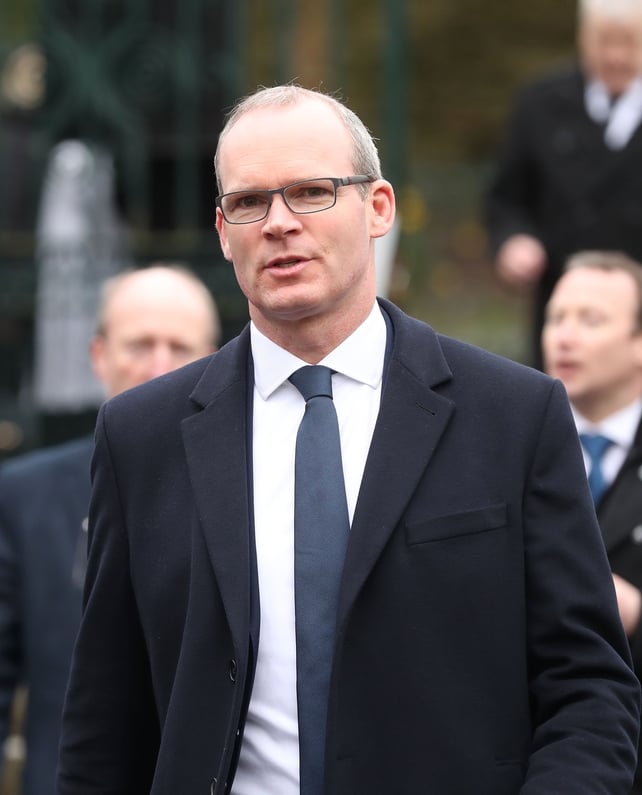 Minister Simon Coveney arrives at St Columba's Church in Derry city