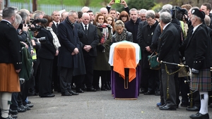 The coffin of Martin McGuinness outside his house ahead of his funeral mass