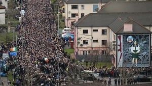 The coffin is carried down Westland Street into the Bogside