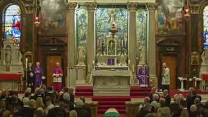 Father Michael Canny received the remains and Bishop Donal McKeown, Bishop of Derry, welcomed the congregation