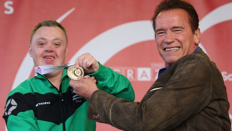 Cyril Walker is presented his silver medal