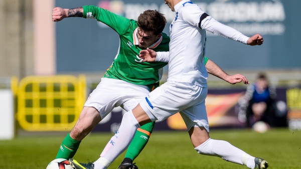 Ireland's Ryan Manning battles Florent Hasani