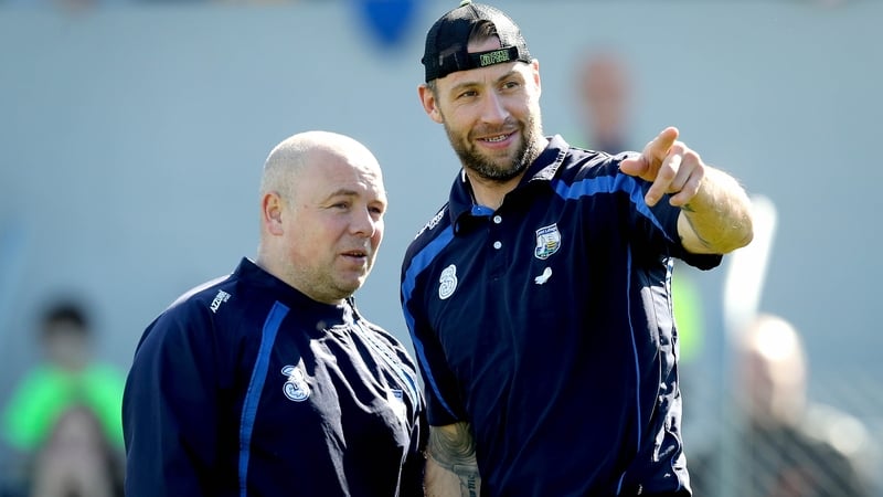 Waterford boss Derek McGrath confers with selector Dan Shanahan