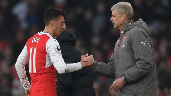 Mesut Ozil and Arsene Wenger