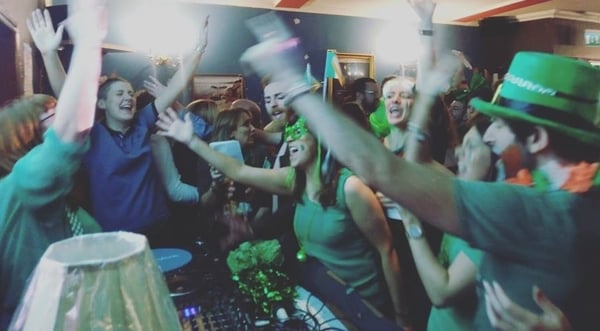 Revelers gather at the Sing Along Social Paddy's Day extravaganza.