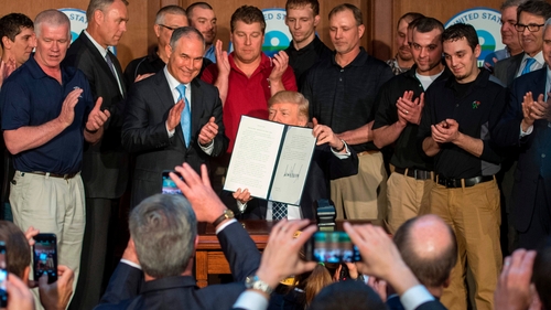 Donald Trump signs he Energy Independence Executive Order at the Environmental Protection Agency