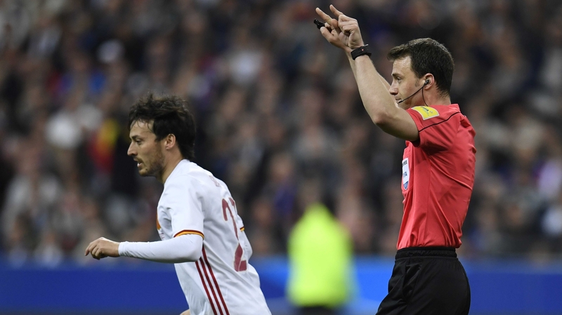 Referee Felix Swayer asks for video assistance