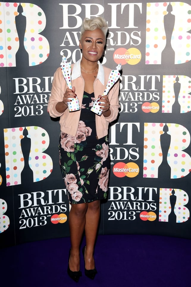 Looking like a blooming rose in this Dolce & Gabbana dress holding her awards for Female Solo Artist and British Album of the Year at the 2013 Brit Awards.