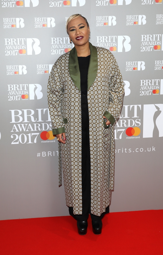 Attending the BRIT Awards this year where she won the Brit Award for British Female Solo Artist in an oversized coat and cat-eye make-up. She simply rocks.