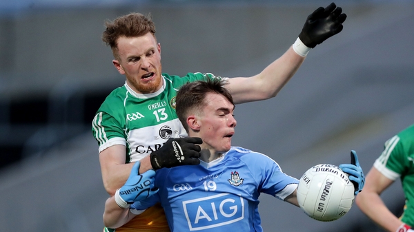 Dublin's Dan O'Brien with Ronan McEvoy of Offaly at O'Moore Park