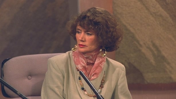 Annie Murphy, a middle aged woman with curly hair