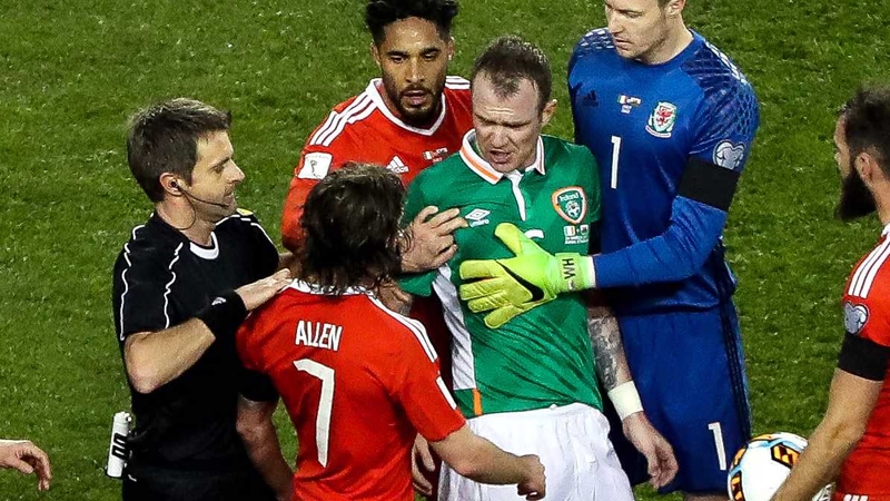 Tempers flare between Glenn Whelan and Joe Allen at the Aviva Stadium