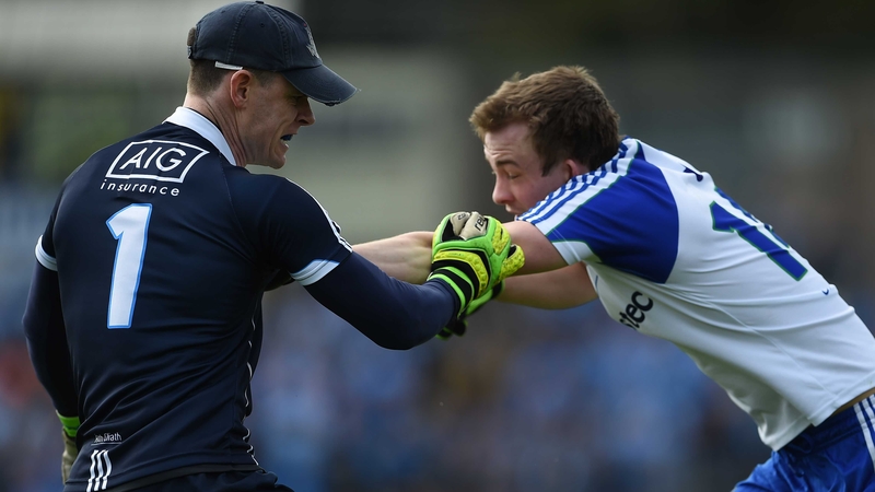 Stephen Cluxton tussles with Jack McCarron in an off-the-ball incident
