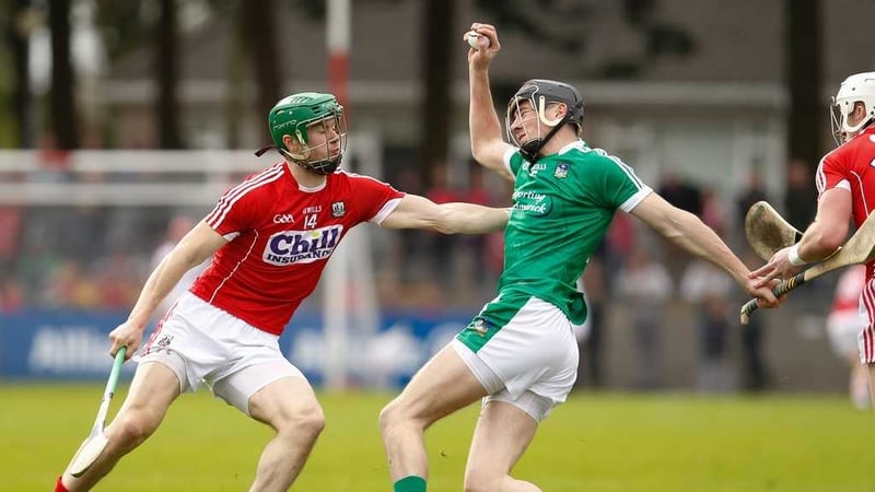 Cork's Seamus Harnedy gets to grips with Limerick's Diarmaid Byrnes