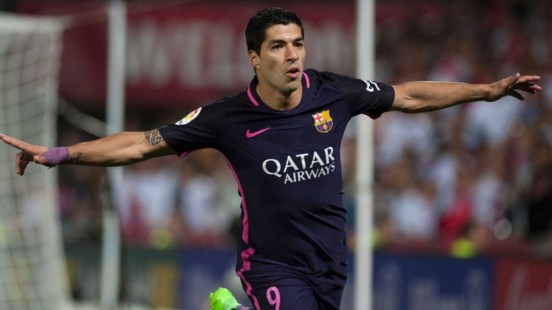 Luis Suarez celebrates his goal against Granada