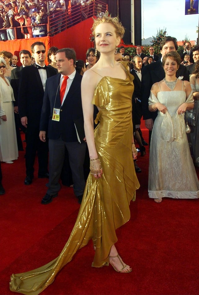 Golden girl in a Dior gown of course! The actress was attending the Oscars ceremony in 2000.