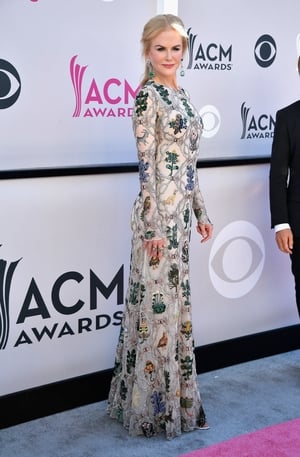 Nicole is a timeless beauty at the Academy Of Country Music Awards this 2017 wearing a dreamy Alexander McQueen gown.