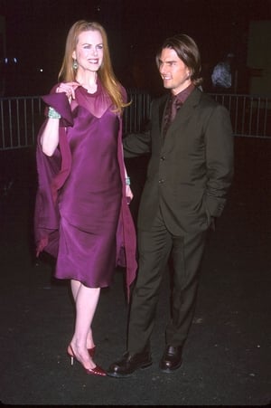 Nicole Kidman and Tom Cruise at the opening party of 'The Blue Room' play in 1998. Nicole went for the 90's trend of matching the colour of her dress with all of her accessories.