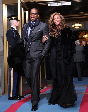 Jay-Z and Beyonce looking like American royalty at the presidential inauguration in 2013. Bey wore a Pucci dress with a Christian Dior coat while Jay rocked a Tom Ford suit.