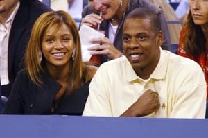 A very understated Beyoncé Knowles and Jay Z attend the women's semi-finals at the 2003 US Open.