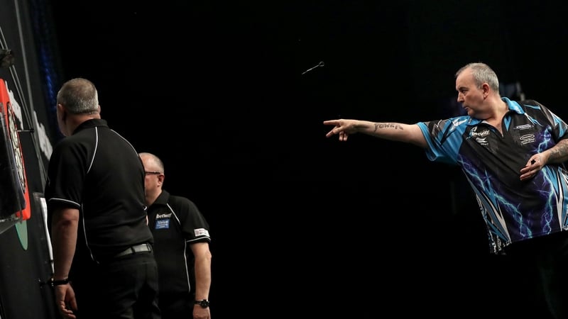 Phil Taylor dominated his match against Raymond van Barneveld
